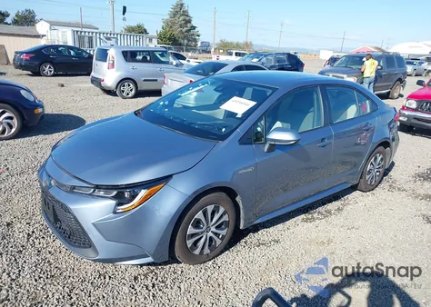 2021 Toyota Corolla Hybrid Le from USA, damaged, VIN JTDEAMDE0MJ003948